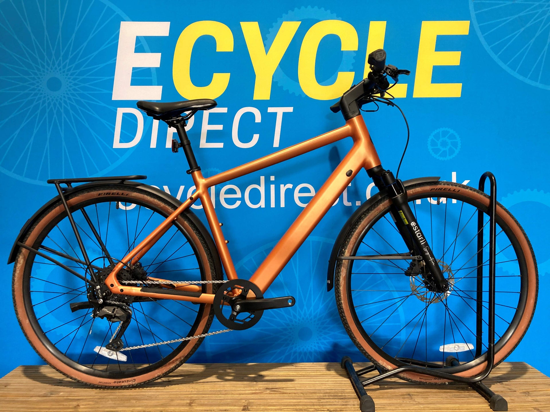 Ex-Demo Estarli E28.9 Pro 9 Speed Electric Bike With Crossbar Frame In Bronze / Frosted Tangerine